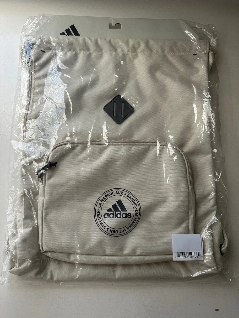 Adidas Beige Drawstring Gym Backpack with Front Zip Pocket